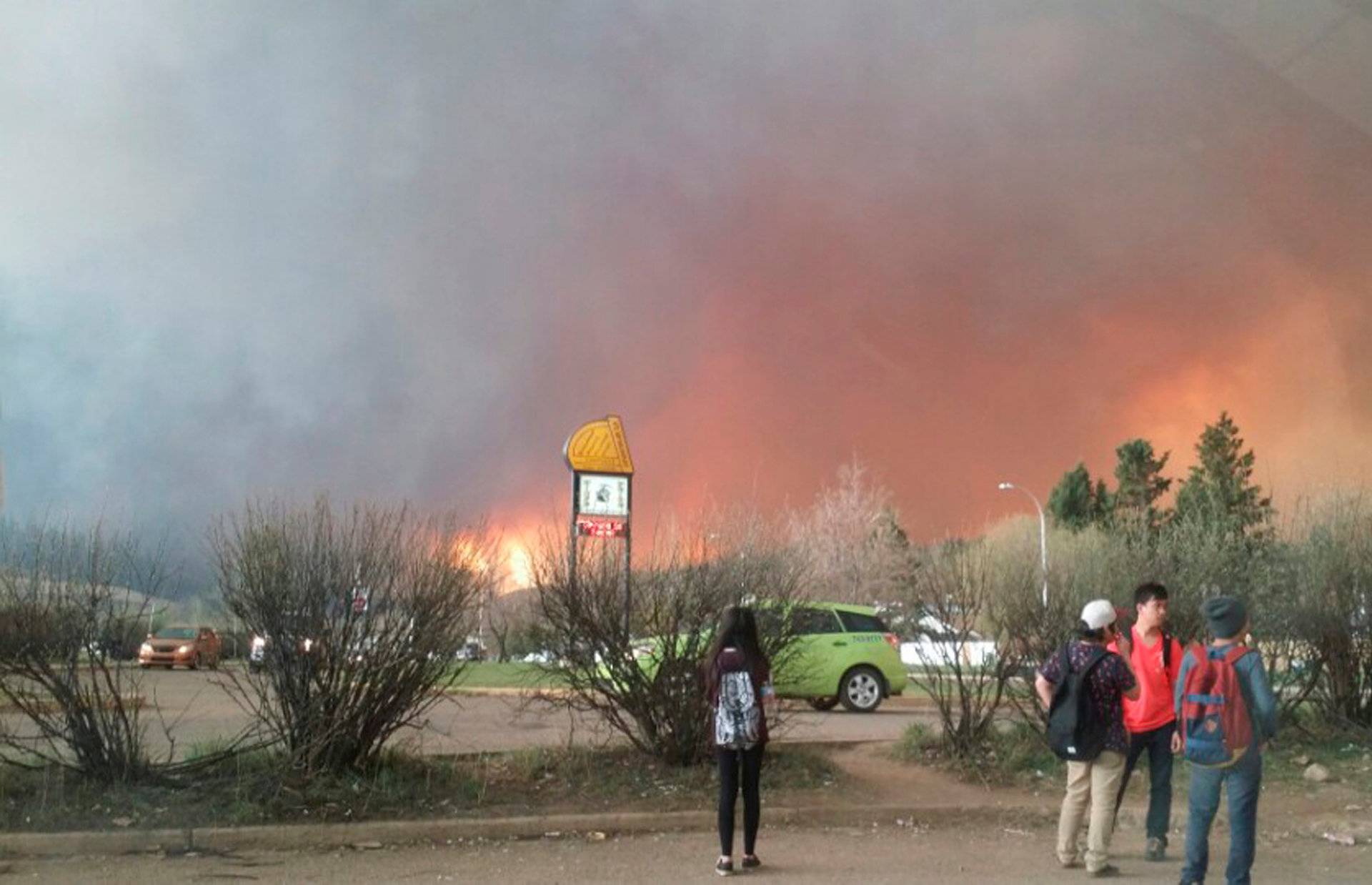 Students from Fort McMurray Composite High School are released early as wildfire burns nearby in Fort McMurray Alberta