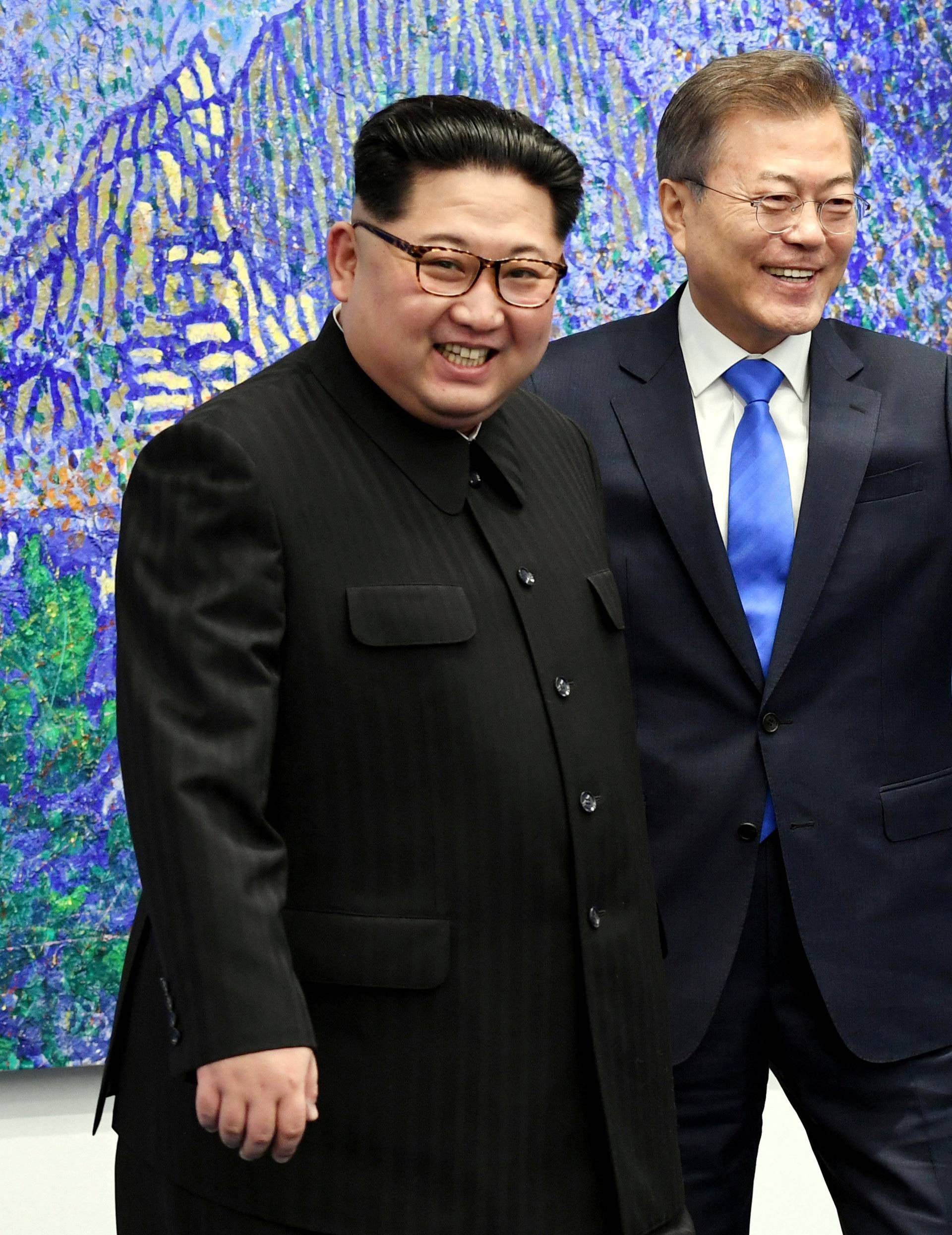 South Korean President Moon Jae-in meets with North Korean leader Kim Jong Un at the Peace House