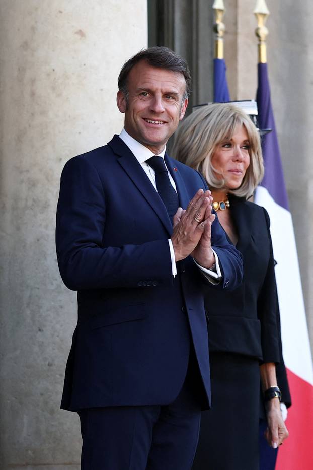 French President Macron welcomes outgoing German Chancellor Scholz in Paris