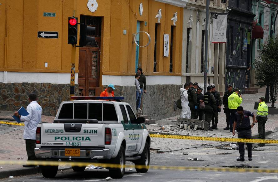 Police work the scene where an explosion occurred near Bogota's bullring