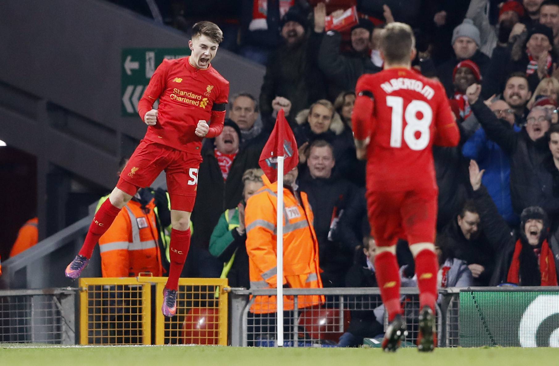 Liverpool's Ben Woodburn celebrates scoring their second goal