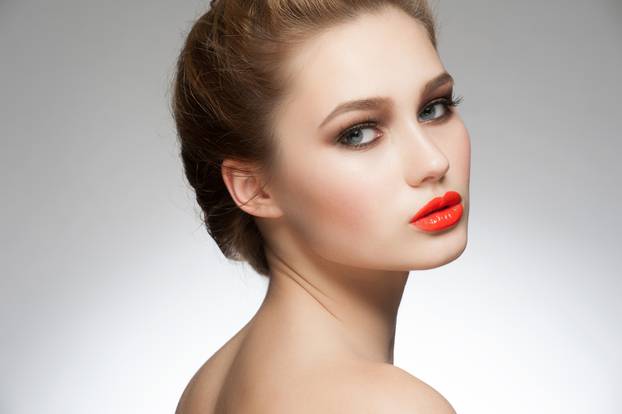 Woman with orange lipstick