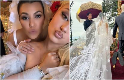 Prve fotografije s vjenčanja u Italiji: Kourtney se udala za Travisa, nosila veo s Gospom