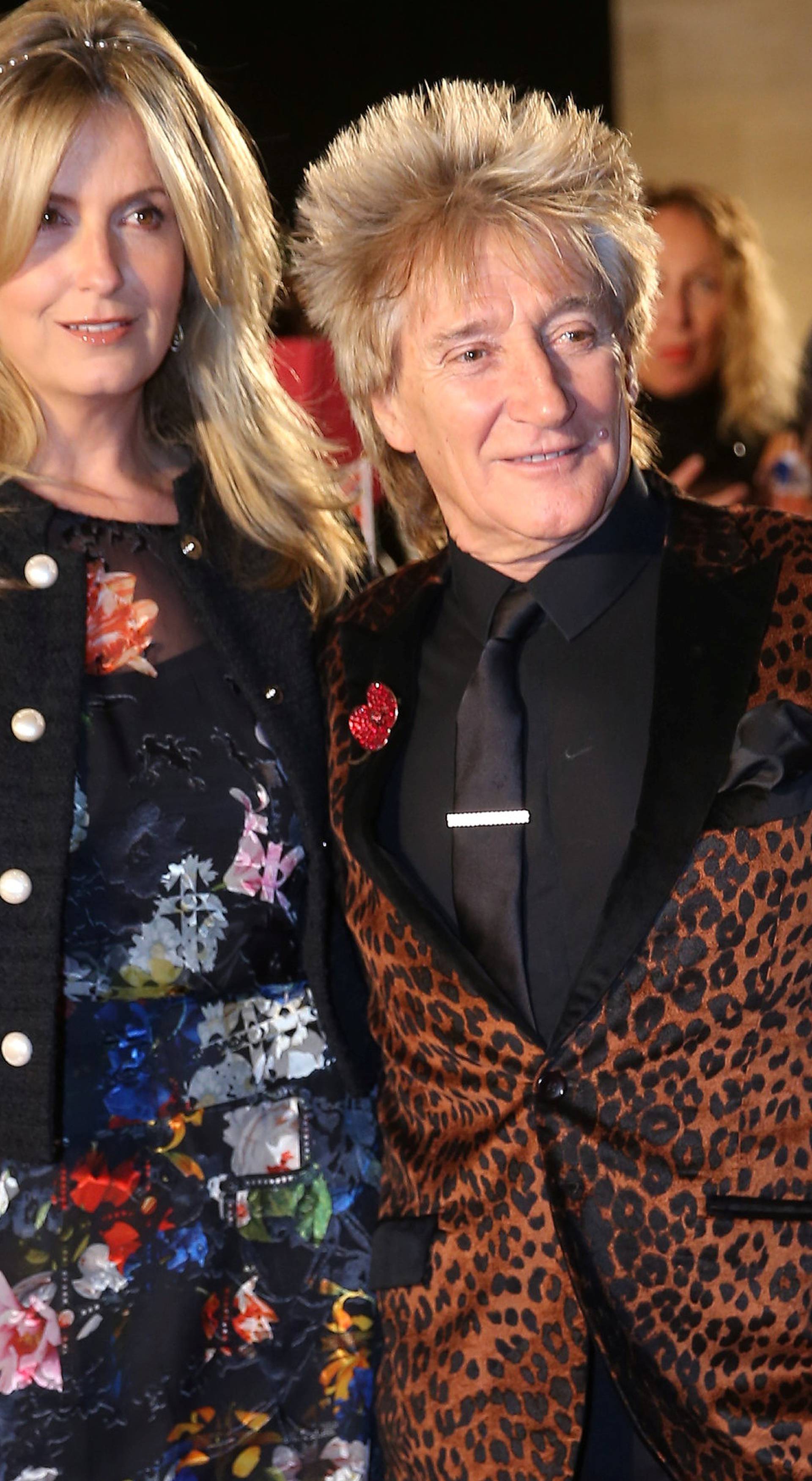 Singer Rod Stewart arrives with his wife Penny Lancaster for the Pride of Britain Awards in London