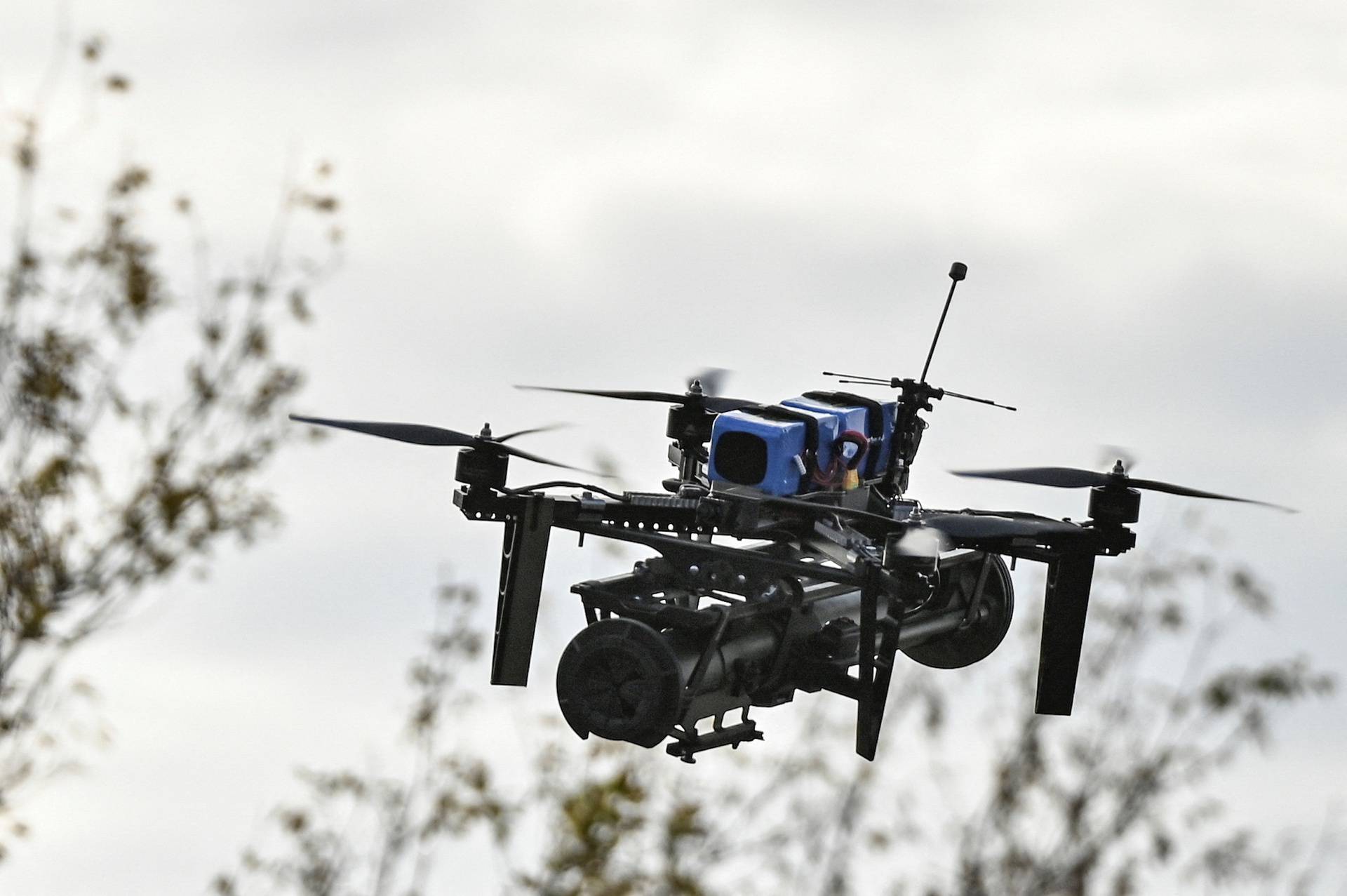 FPV drone with an attached portable grenade launcher is seen during a test fly conducted by Ukrainian servicemen at their position near a frontline, amid Russia's attack on Ukraine in the Zaporizhzhia region