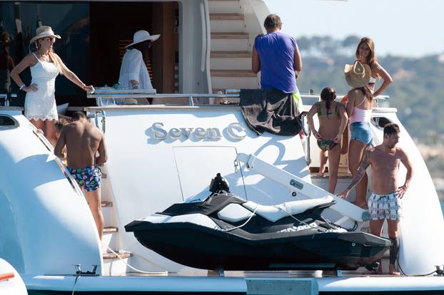 Cesc Fabregas is joined by wife Daniella Semaan as they accompany Lionel Messi, Luis Suarez and their families aboard a luxury yacht during holidays in Ibiza