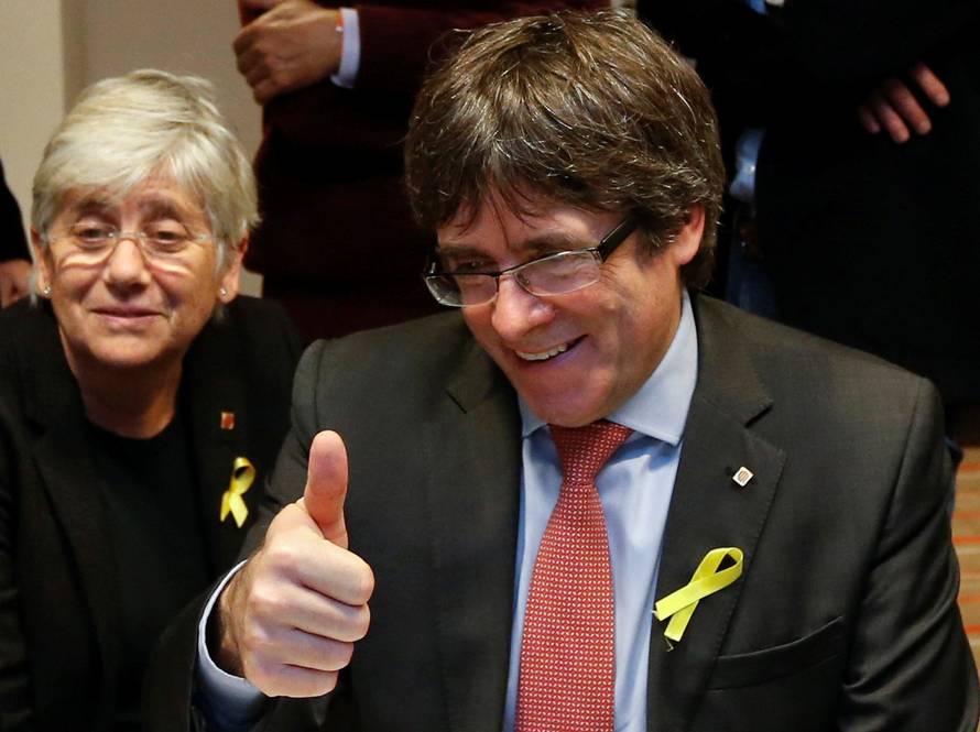 Carles Puigdemont, dismissed President of Catalonia, reacts while viewing results in Catalonia's regional election in Brussels