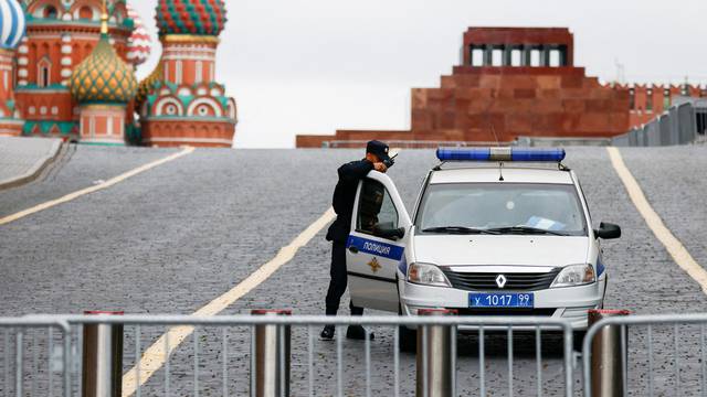 A police officer guards the closed Red Square in Moscow
