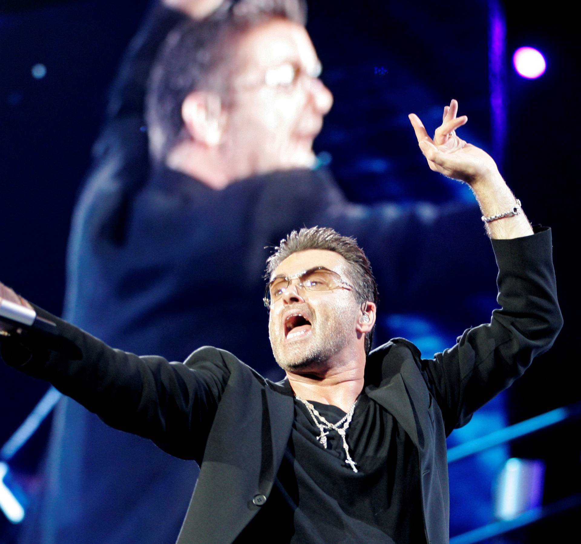 FILE PHOTO:  British pop singer George Michael performs during his concert as part of his 25 Live European tour at the OAKA Stadium in Athens