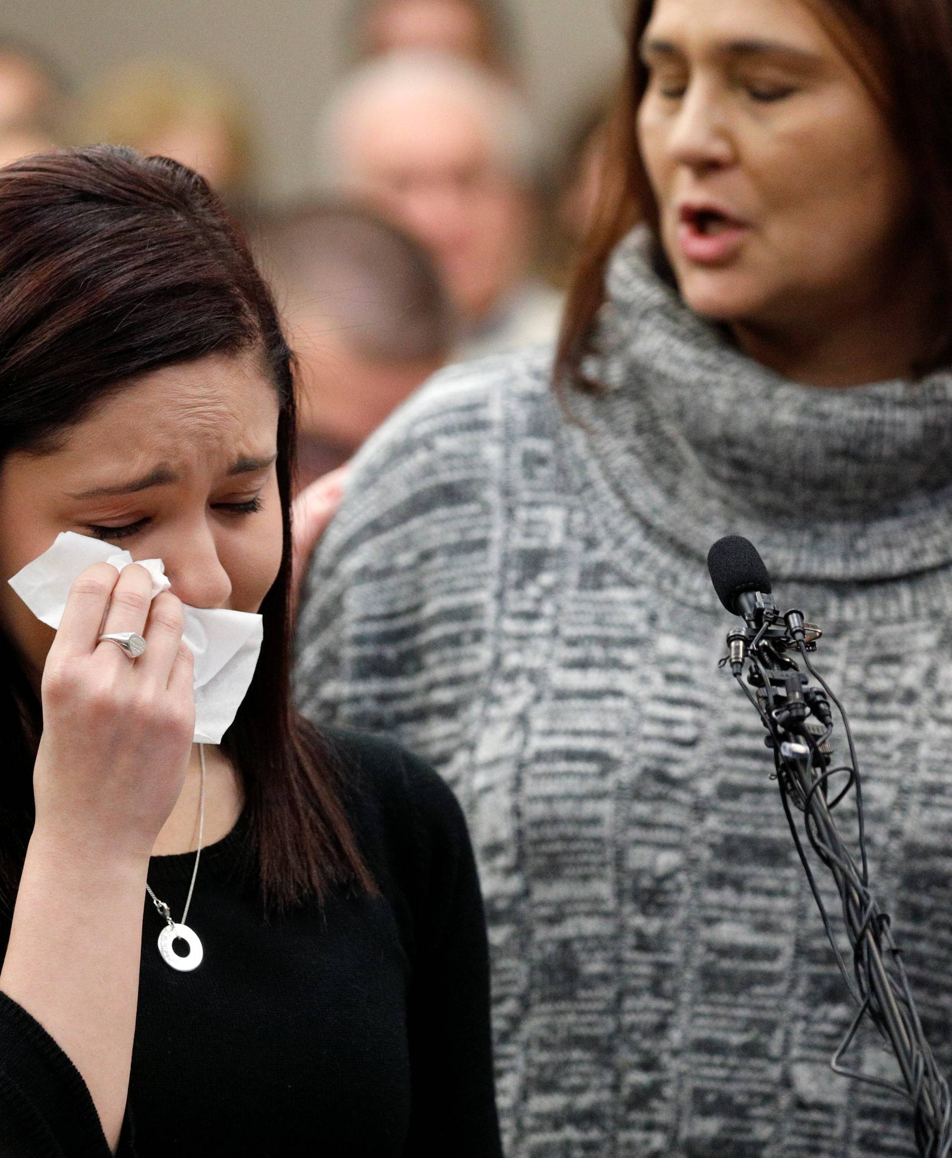 Victim Kaylee Lorincz wipes tears as she speaks at the sentencing hearing for Larry Nassar, a former team USA Gymnastics doctor who pleaded guilty in November 2017 to sexual assault charges, in Lansing