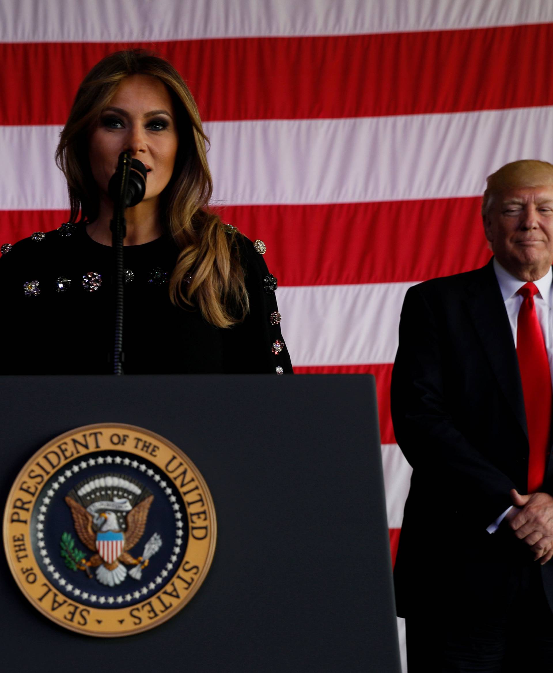 The U.S. first lady introduces Trump as he rallies with service members at Sigonella Air Force Base at Naval Air Station Sigonella at the end of Trump's participation in the G7 summit in Sicily, Italy