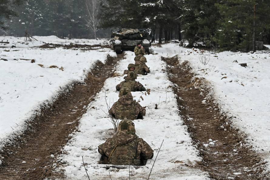 Ukrainian service members attend military exercises in Chernihiv region