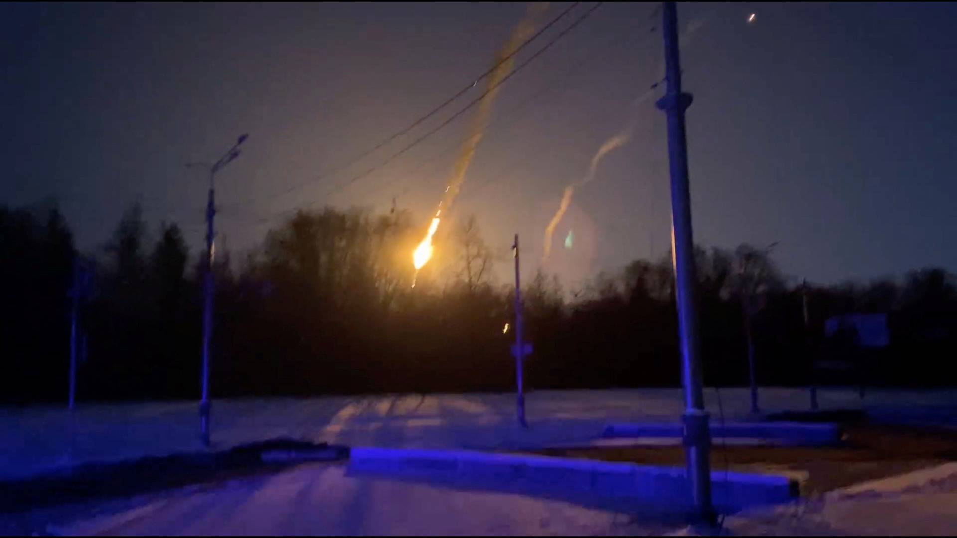 A view of what Ukraine's armed forces say is a downed Russian jet crashing in flames in Kharkiv