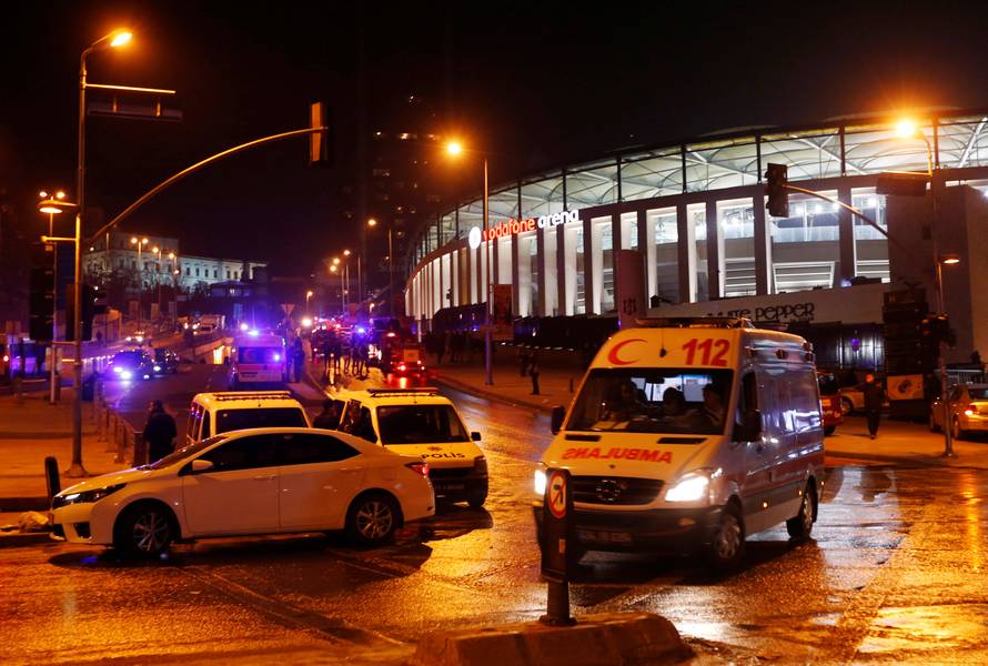 An ambulance leaves the scene after a blast in Istanbul
