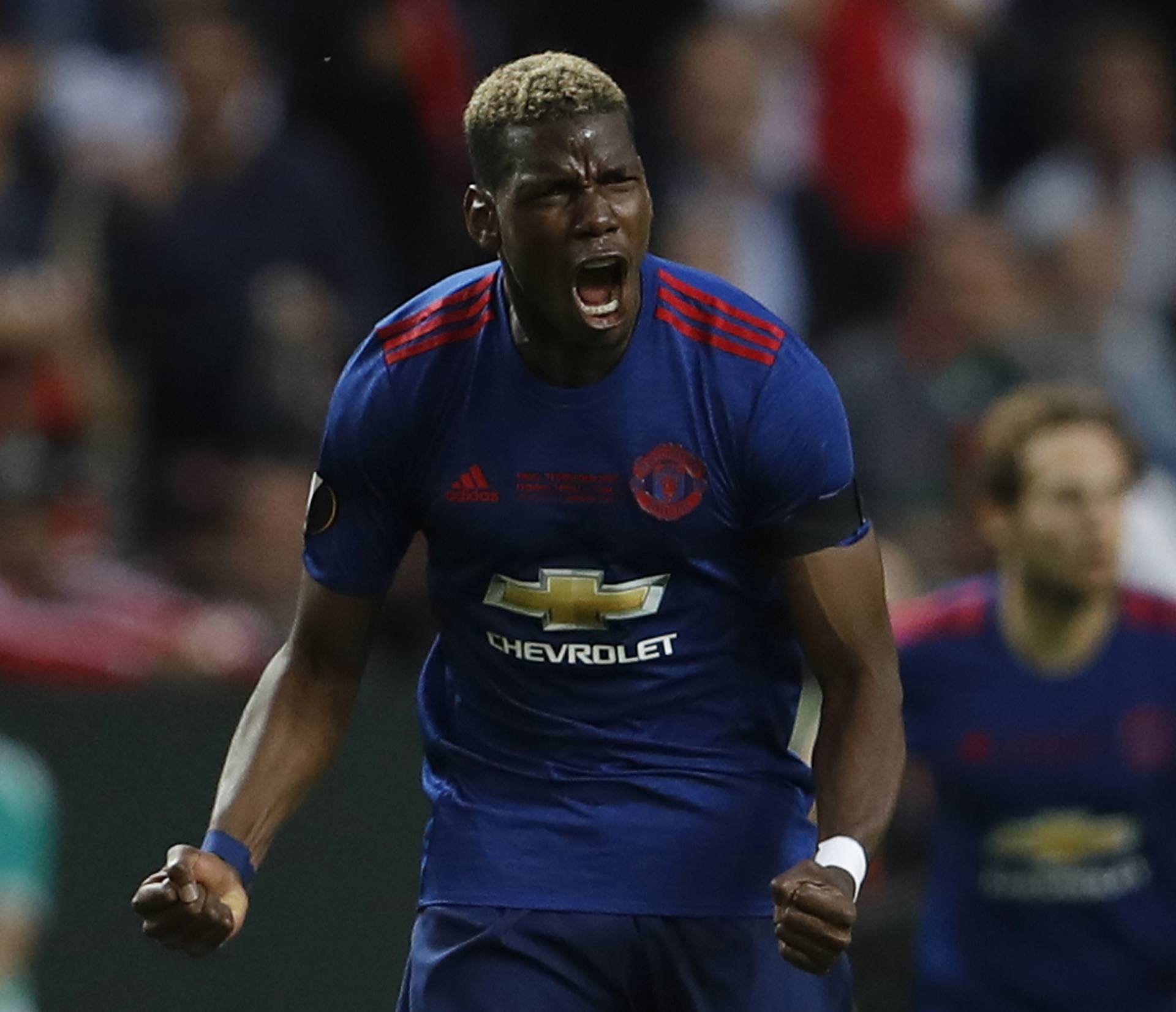 Manchester United's Paul Pogba celebrates scoring their first goal