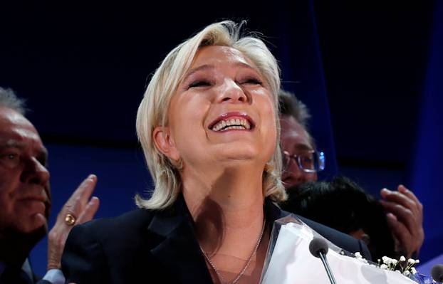 Marine Le Pen, French National Front (FN) political party leader and candidate for French 2017 presidential election, celebrates after early results in the first round of 2017 French presidential election, in Henin-Beaumont