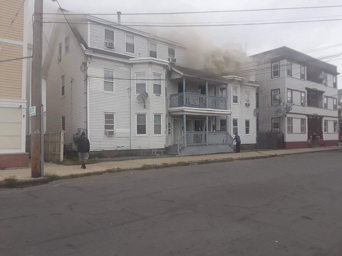 Photo from social media by Boston Sparks shows smoke rising from a building after explosions in Lawrence, Massachusetts