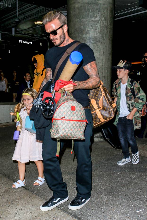 David & Victoria Beckham Catch a Flight Out of LAX With Their Kids