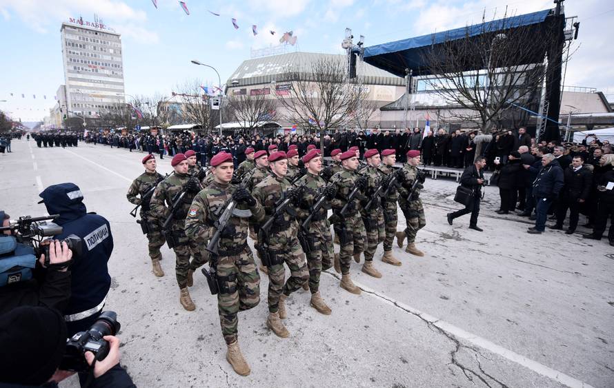 Members of special police forces of Republic of Srpska march during a parade marking the anniversary of Republic of Srpska in Banja Luka