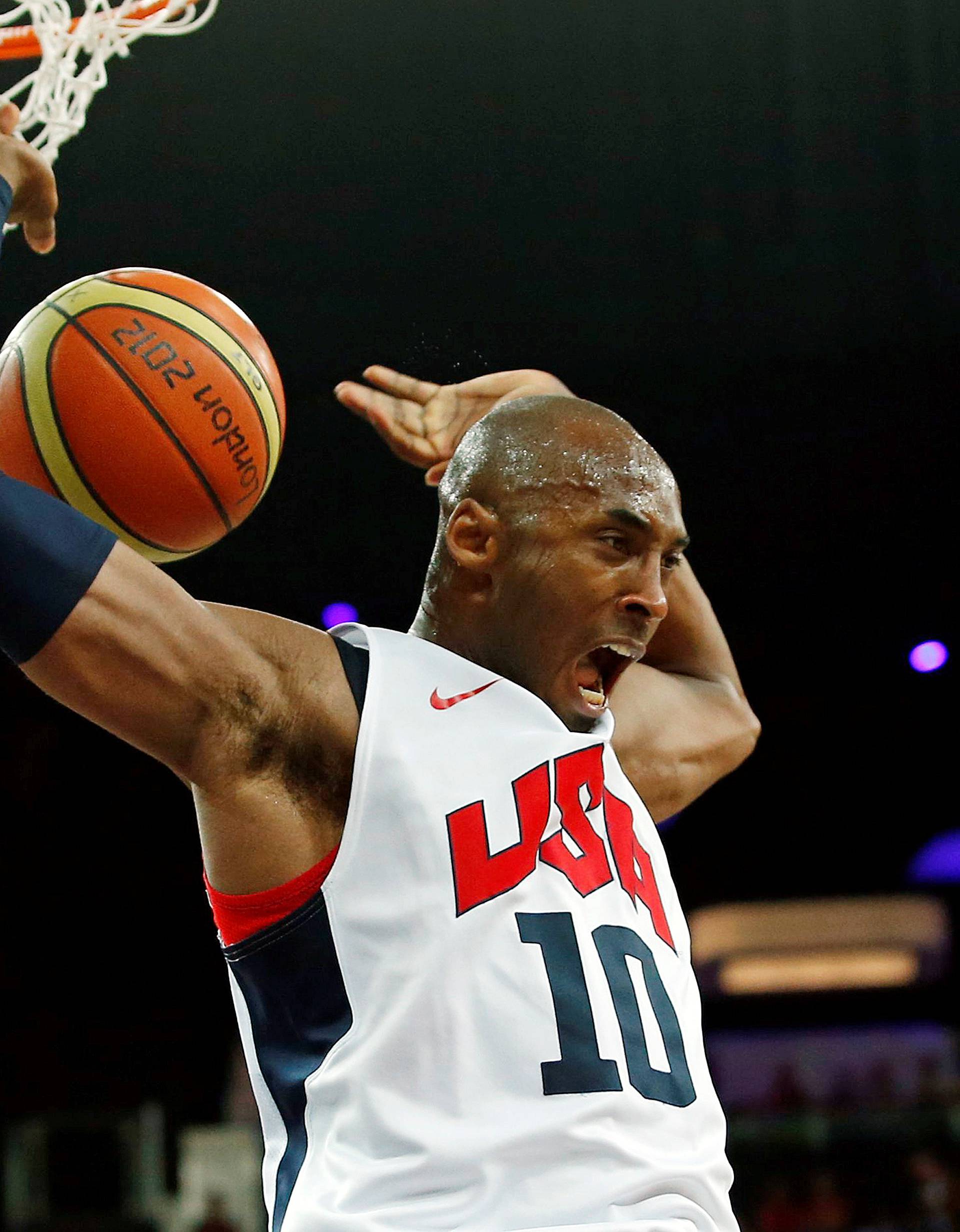 FILE PHOTO: Bryant of the U.S. dunks against Spain during their men's gold medal  basketball match at the North Greenwich Arena in London during the London 2012 Olympic Games