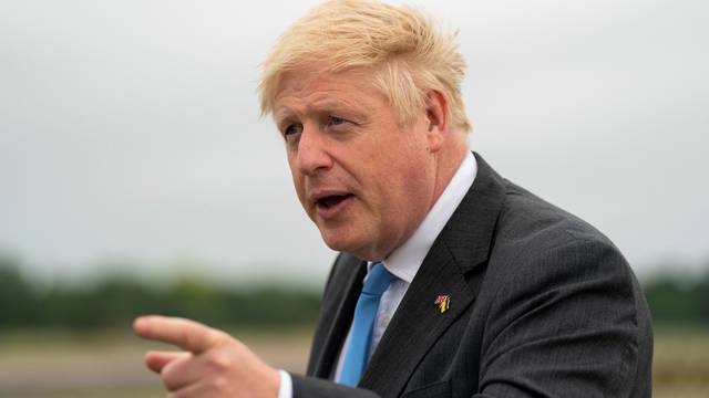 British Prime Minister Boris Johnson arrives at RAF Brize Norton in Oxfordshire