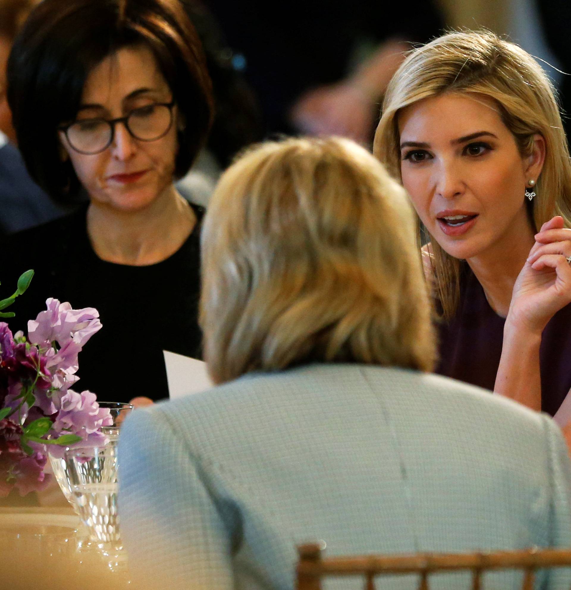 Ivanka Trump joins the U.S. first lady as she welcomes guests for an International Women's Day luncheon at the White House in Washington