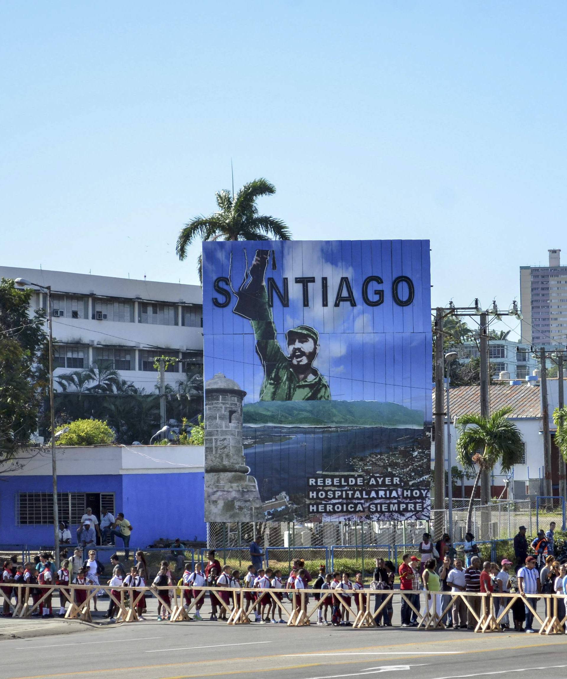 Students file past a tribute to Cuba's late President Fidel Castro in Santiago de Cuba