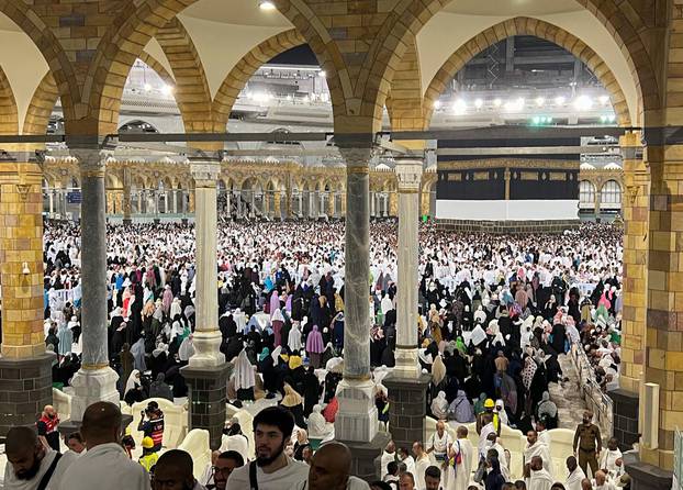 Muslim pilgrims perform the Umrah at the holy Kaaba, in the holy city of Mecca