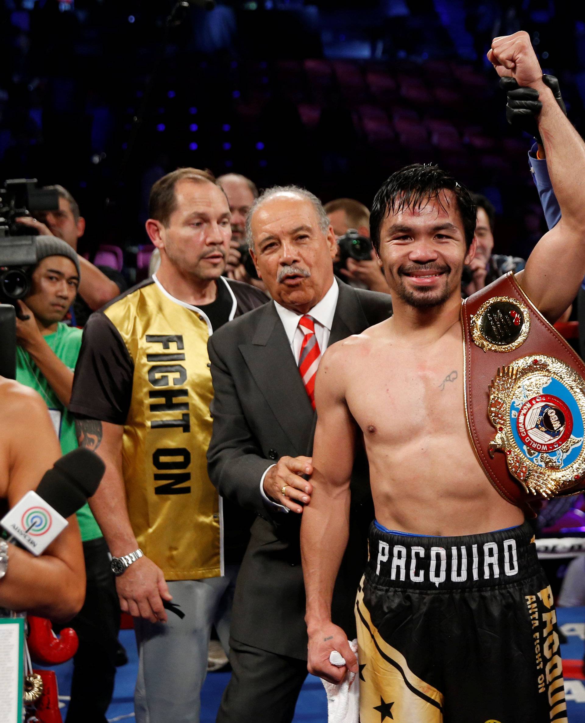 Manny Pacquiao celebrates his victory over Jessie Vargas following their title fight at the Thomas & Mack Center in Las Vegas