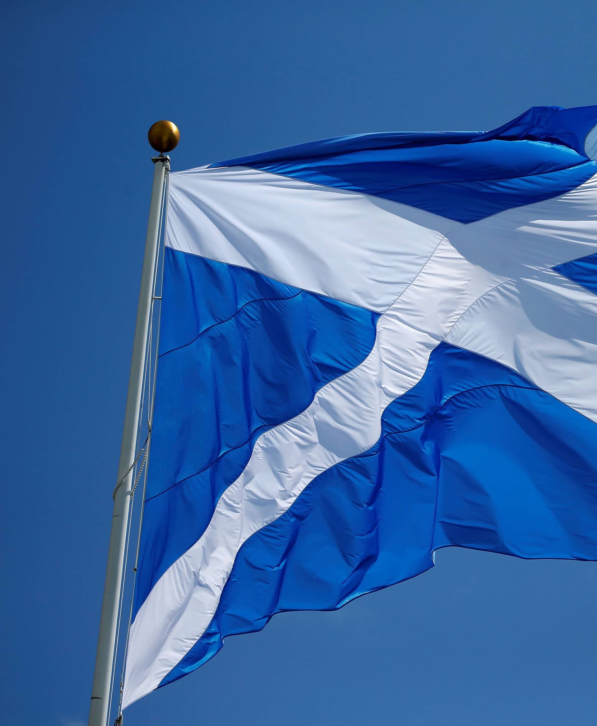 The Scottish flag flies over the Trump International Golf Links in Aberdeen