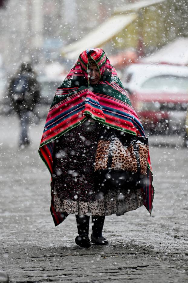 Snow falls amid low temperatures in Bolivia, in El Alto