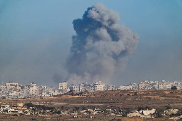 Smoke rises from Gaza after an explosion, as seen from the Israeli side of the border