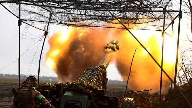 FILE PHOTO: Ukrainian artillery operates in a position near Bakhmut