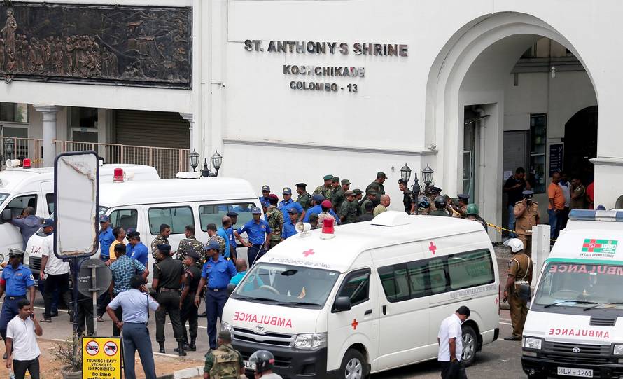 Sri Lankan military officials stand guard in front of the St. Anthony's Shrine, Kochchikade church after an explosion in Colombo