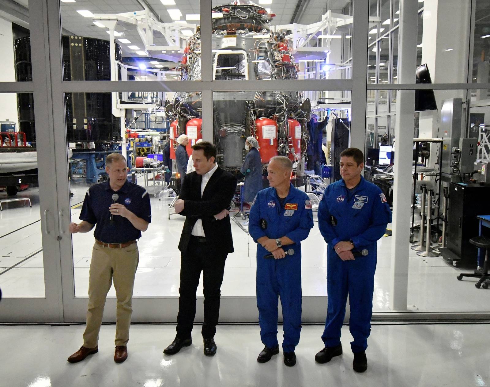 NASA Administrator Jim Bridenstine, SpaceX Chief Engineer Elon Musk, NASA astronauts Doug Hurley and Bob Behnken, take questions from the media after a tour of SpaceX headquarters in Hawthorne