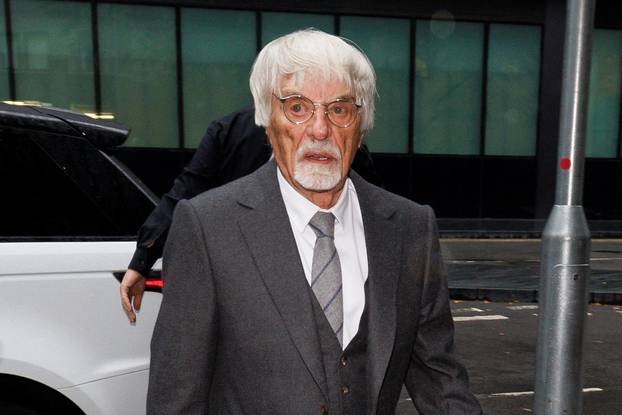 Bernie Ecclestone arrives for a fraud case hearing, in London