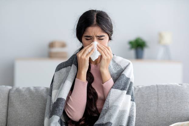 Unhappy,Sad,Young,Indian,Female,In,Plaid,Suffering,From,Fever