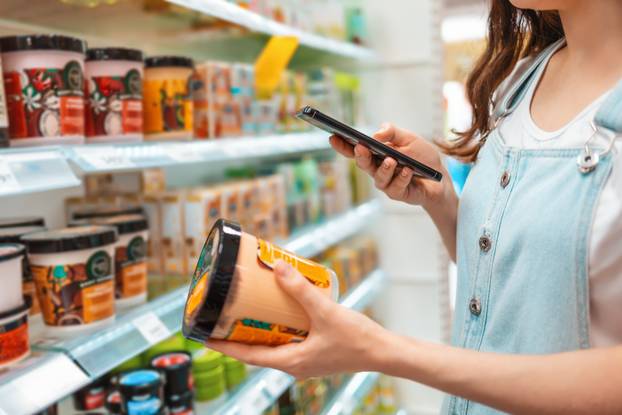 Shopping.,Young,Beautiful,Woman,Taking,Pictures,Of,A,Jar,Of