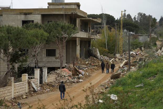 Scenes of destruction in the village of Debbine