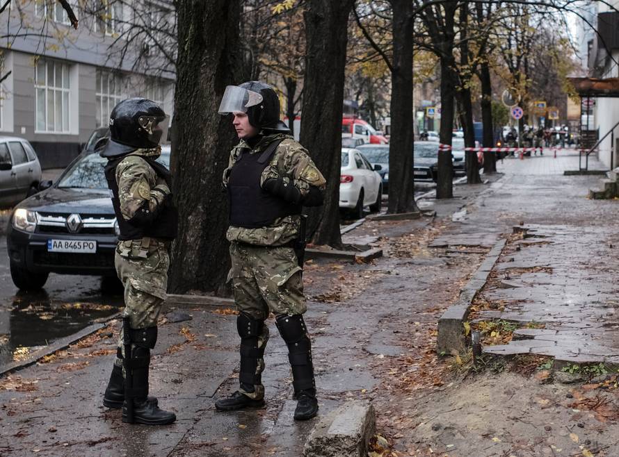A special police unit stands guard near the apartment of Ukrainian Interior Minister Avakovâs son,  Oleksandr, who was detained today, local media reported, in Kharkiv