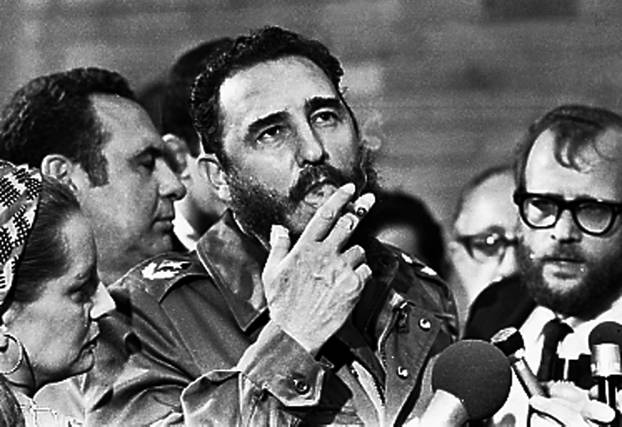 File photo of then Cuban Prime Minister Fidel Castro smoking a cigar during interviews with the press during a visit of U.S. Senator Charles McGovern, in Havana