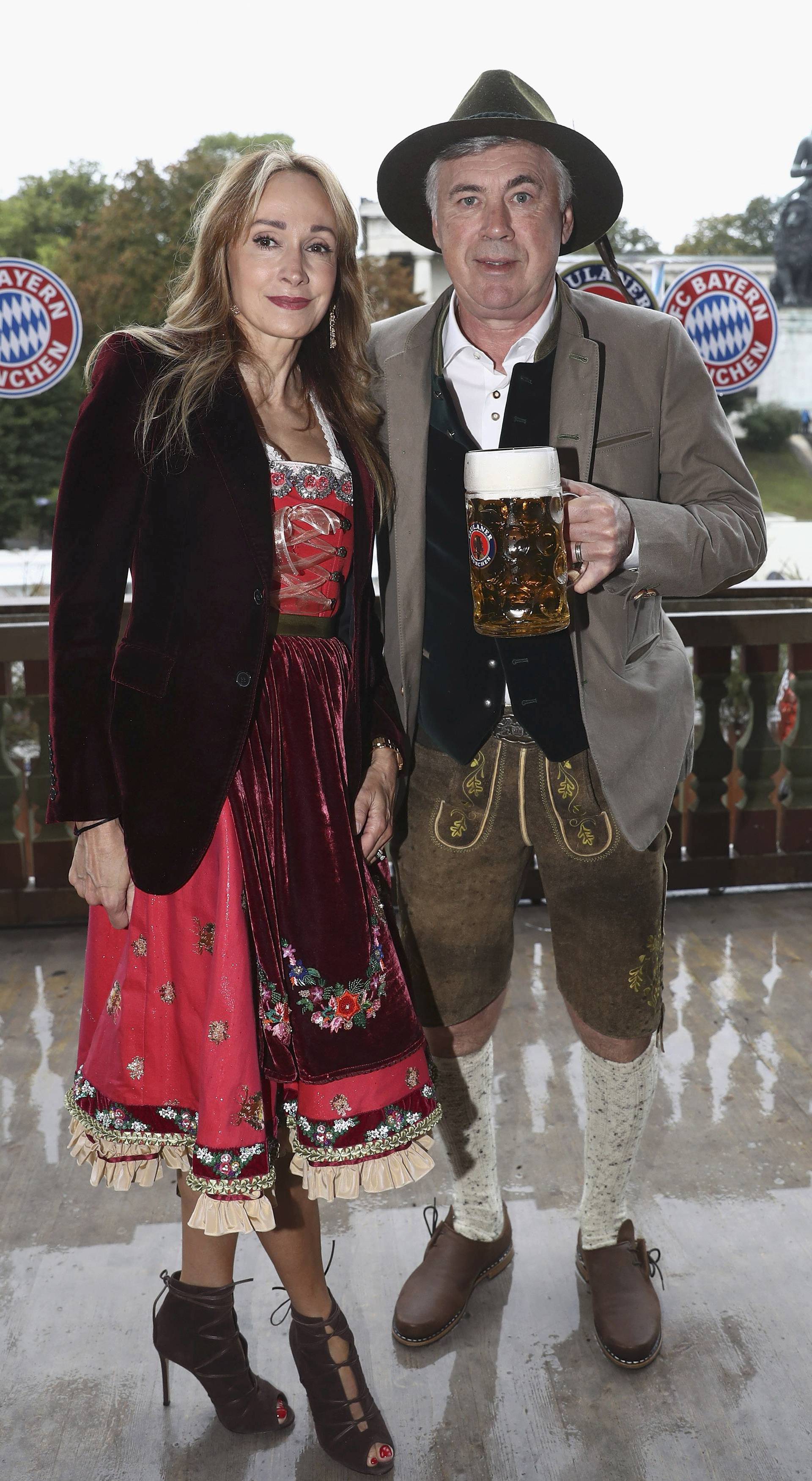 Ancelotti, head coach of FC Bayern Munich and his wife Mariann Barrena McClay pose during their visit at the Oktoberfest in Munich