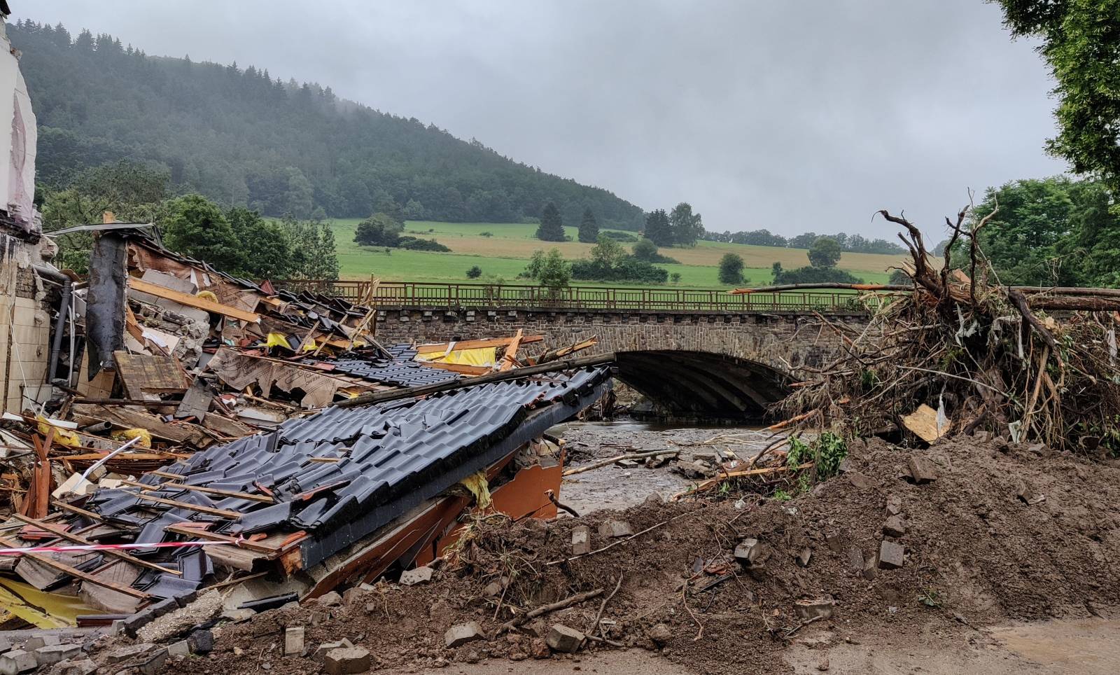 A collapsed building is pictured after a flood in Schuld