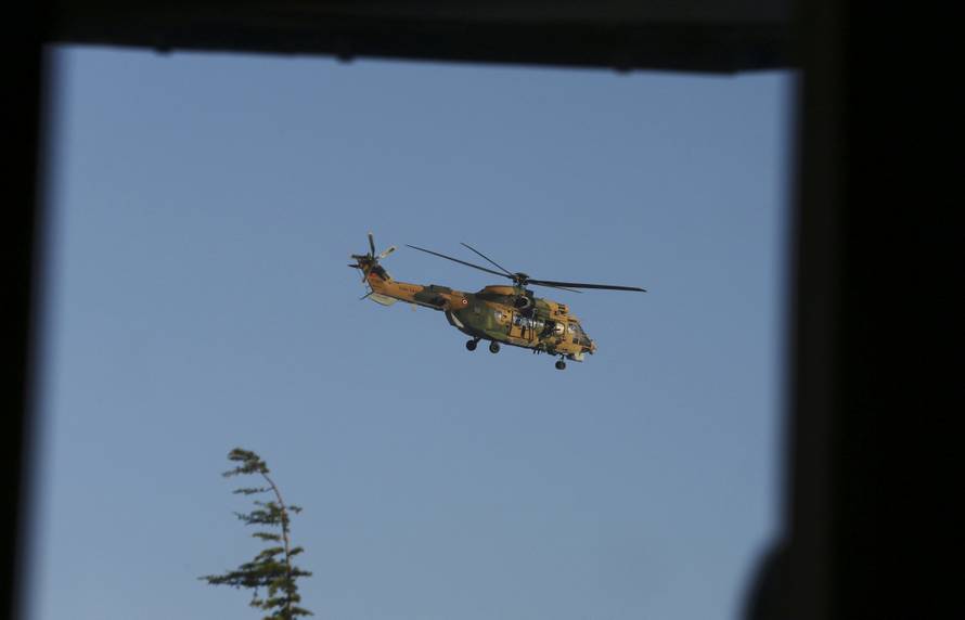 A helicopter hovers near the Ataturk Airport in Istanbul