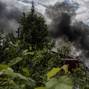 A smoke rises after shelling near the Ukraine-Russia border in the town of Vovchansk