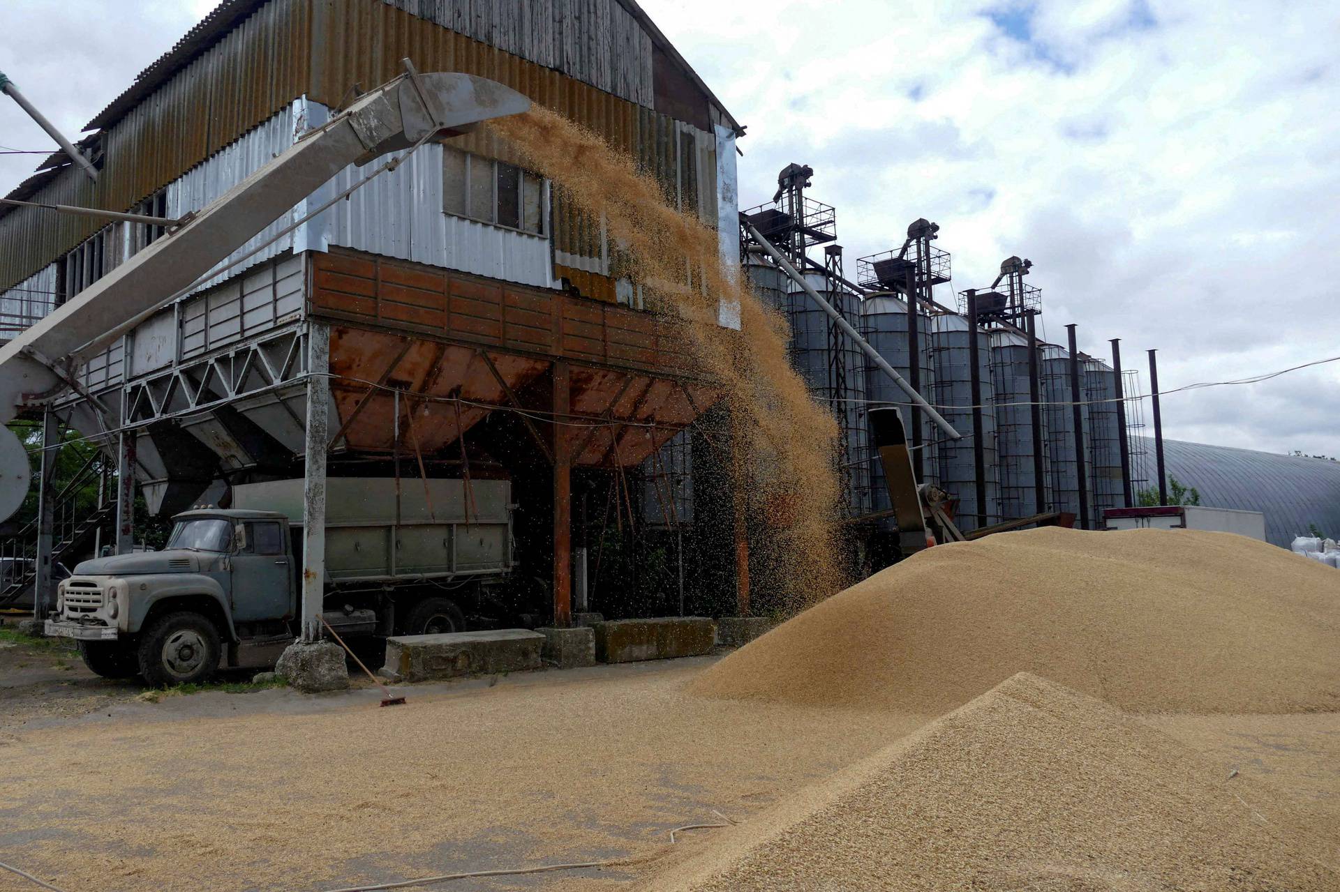 FILE PHOTO: A truck is seen at a grain terminal during barley harvesting in Odesa region