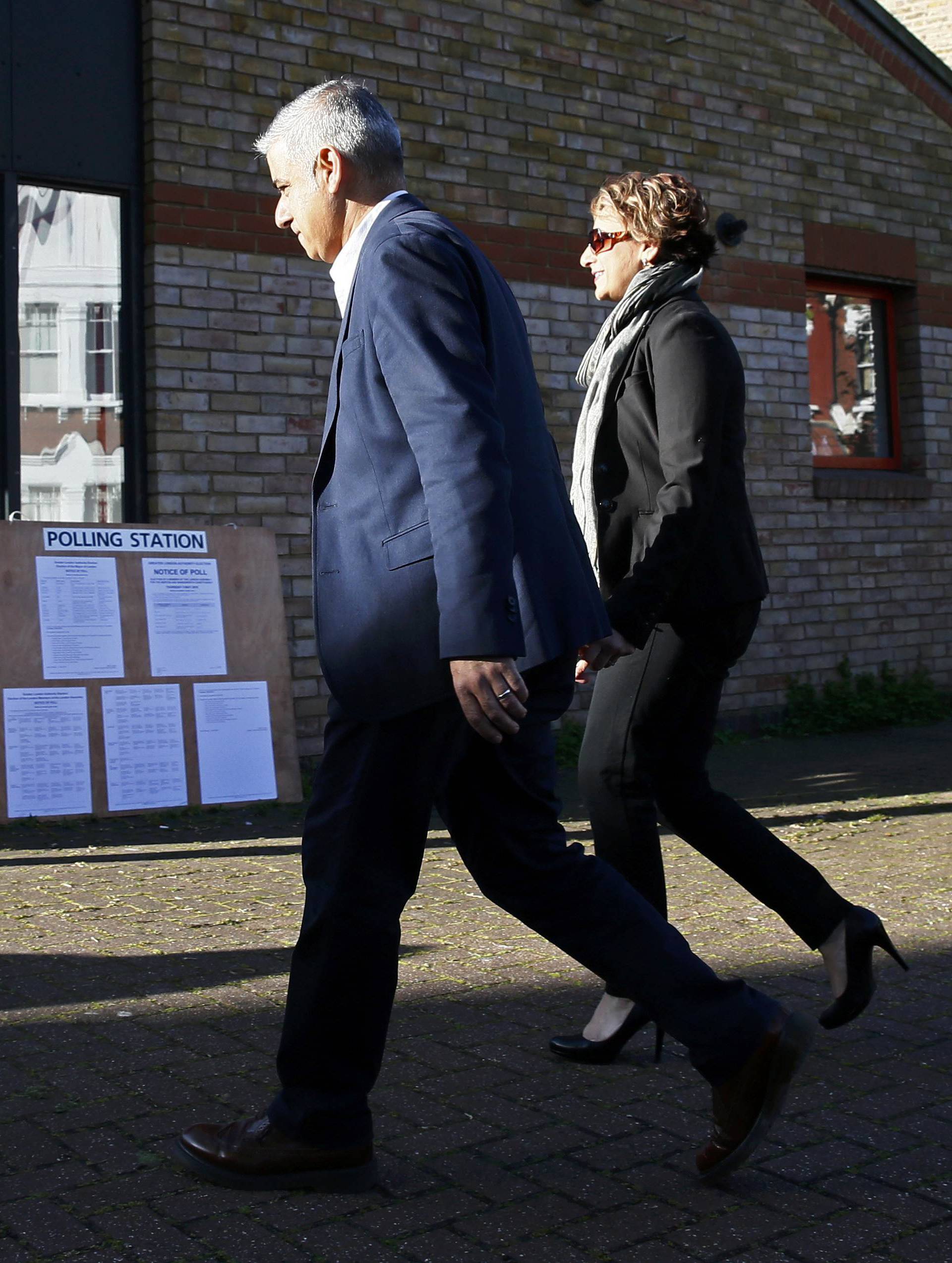 Khan, Britain's Labour Party candidate for Mayor of London and his wife Saadiya arrive to cast their votes for the London mayoral elections
