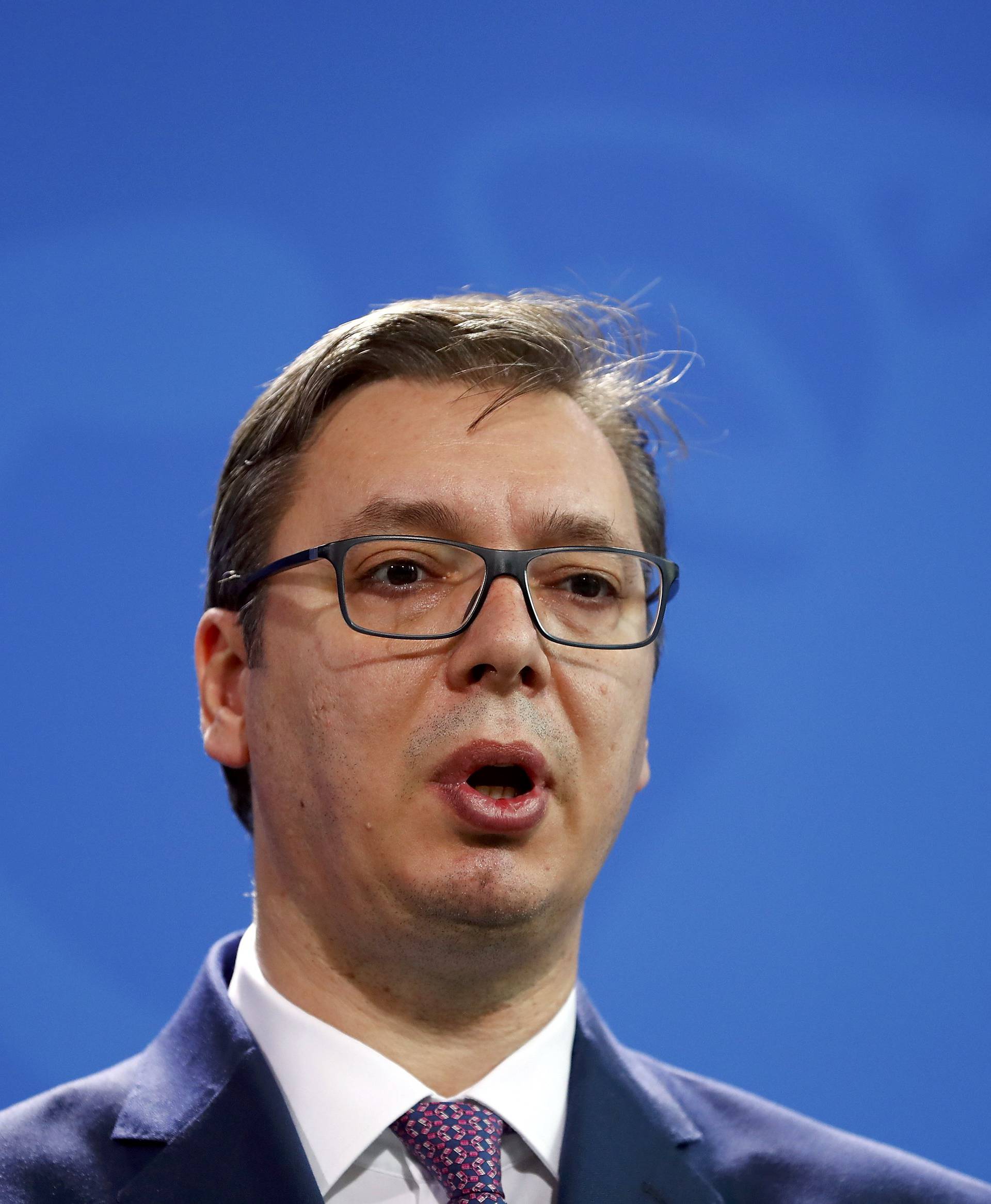 Serbian Prime Minister Aleksandar Vucic gives a statement before talks with German Chancellor Angela Merkel at the Chancellery in Berlin
