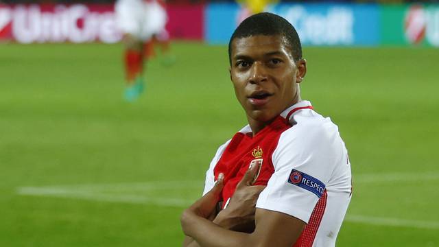 Monaco's Kylian Mbappe-Lottin celebrates scoring their third goal