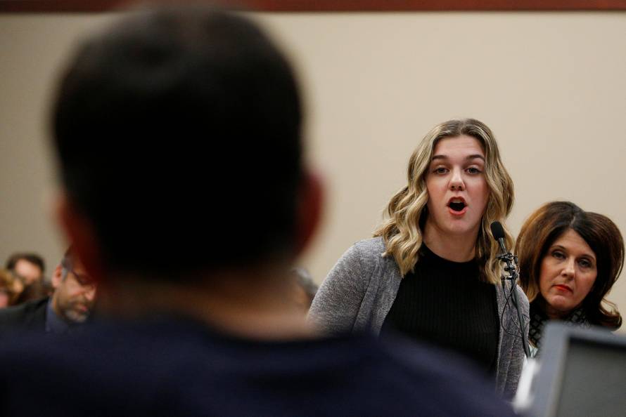 Victim Hannah Morrow speaks at the sentencing hearing for Larry Nassar, a former team USA Gymnastics doctor who pleaded guilty in November 2017 to sexual assault charges, in Lansing, Michigan